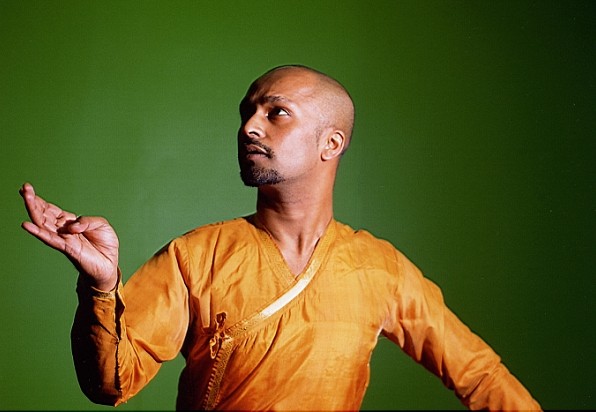 Akram Khan in a classical Indian dance pose.